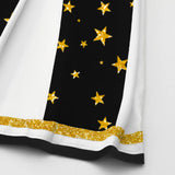 Close-up of a pleated cheerleading skirt hem showing black panels with gold stars, white panels, and gold glitter trim.