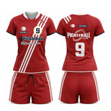 Custom red and white short sleeve V-neck pickleball apparel set with diagonal stripe design, club logo, number, and shorts.